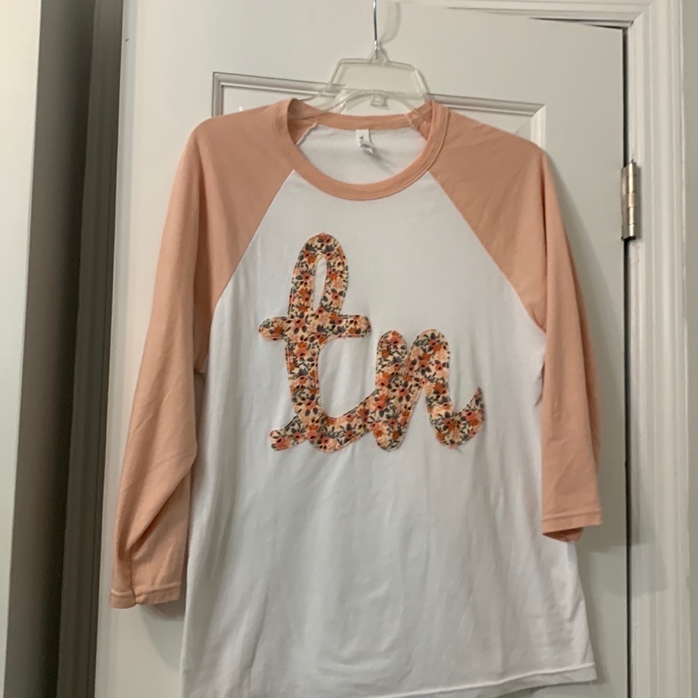 3/4 sleeve Tennessee top bought at a boutique very soft M.